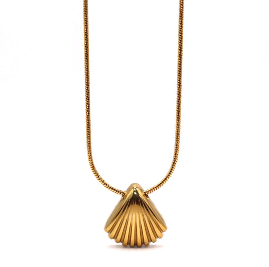 Gold shell pendant necklace on a white background